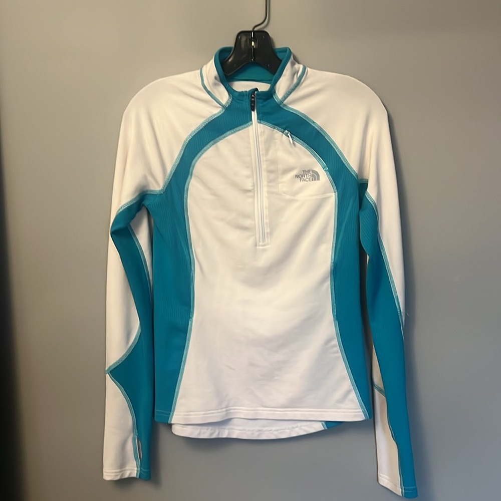 North face running top. White and blue size S